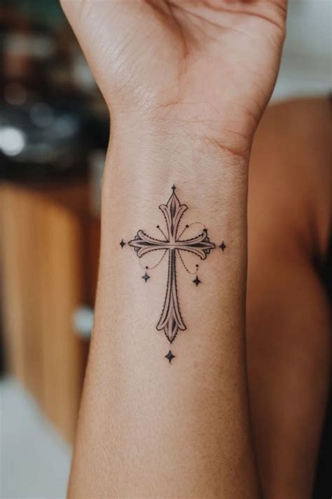 25 Elegant Small Cross Wrist Tattoos For Women To Inspire Your Next Ink