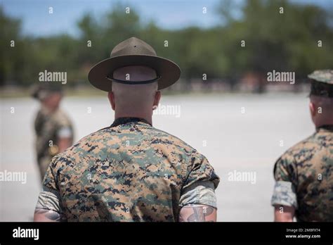 A U S Marine Corps Drill Instructor Teaches A Group Of Marines At A U S Marine Corps Drill Instructor Teaches A Group Of Marines At