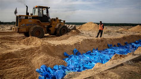 More Than 100 Bodies Are Delivered To A Mass Grave In Southern Gaza