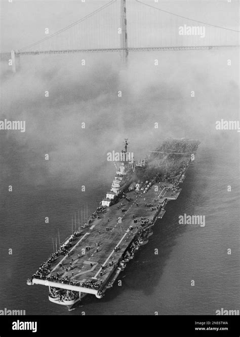 The Aircraft Carrier U S S Boxer Creeps Through The Fog Under The The Aircraft Carrier U S S Boxer Creeps Through The Fog Under The