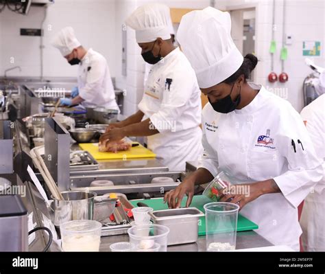 U S Army Pvt Randee Hall Team Hawaii Prepares A Dish For The Joint